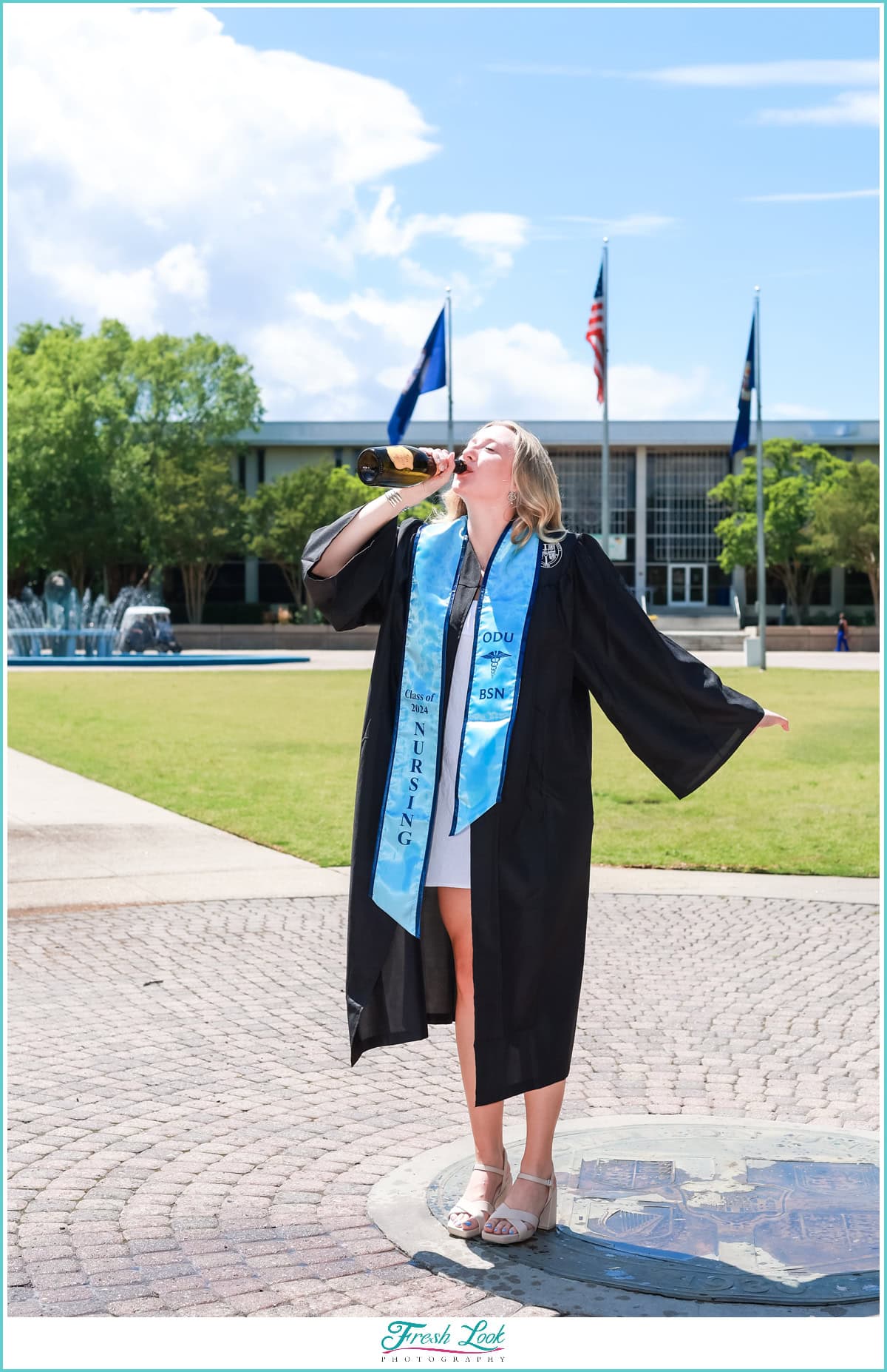 Drinking Champagne to celebrate college graduation